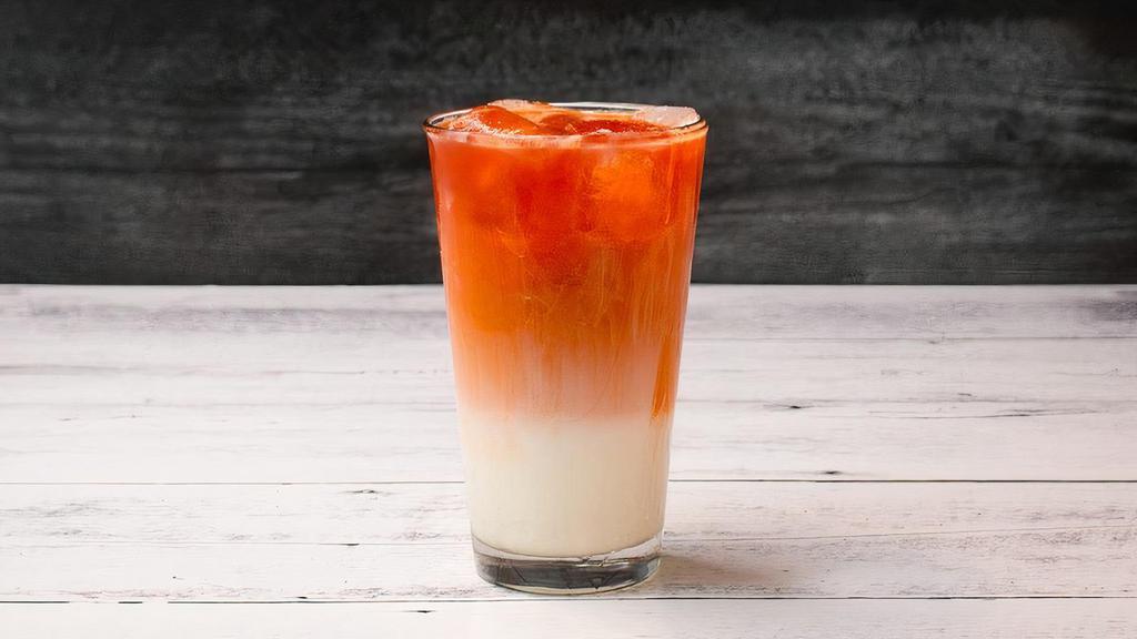 Thai Tea · Classic Thai Tea topped with a delicate layer of house-made creamy sweet milk. ICED LARGE ONLY
