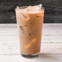 Pudding Milk Tea · Black tea with non-dairy creamer and pudding