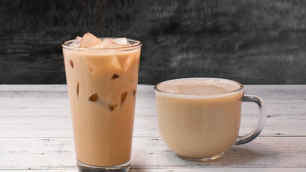 Caramel Milk Tea · Black tea with non-dairy creamer and caramel sauce.