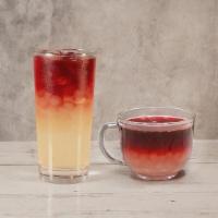Hibiscus Lemonade · A freshly brewed herbal tea with a slight tart and cranberry-like flavor with lemon juice an...