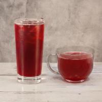 Hibiscus Tea · A freshly brewed herbal tea with a slight tart and cranberry-like flavor