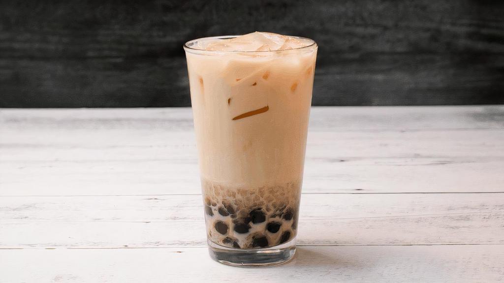 Zebra Oolong Milk Tea · Our Oolong Milk Tea with Boba and Konjac Pearl.