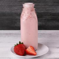 Strawberry De Leche · Cold and refreshing drink combining the sweetness of strawberries and cream. ICED LARGE ONLY