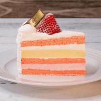 Deluxe Strawberry Cream | Slice · Strawberry chiffon cake layered with strawberry mousse and vanilla creme brulee. It is decor...