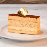 Classic Tiramisu | Slice · A traditional Italian dessert layered with mascarpone cheese and coffee flavored lady finger...