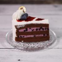 Blueberry Cream | Slice · Light chocolate cake layered with sweet blueberry cream. Decorated with soft cream and fresh...