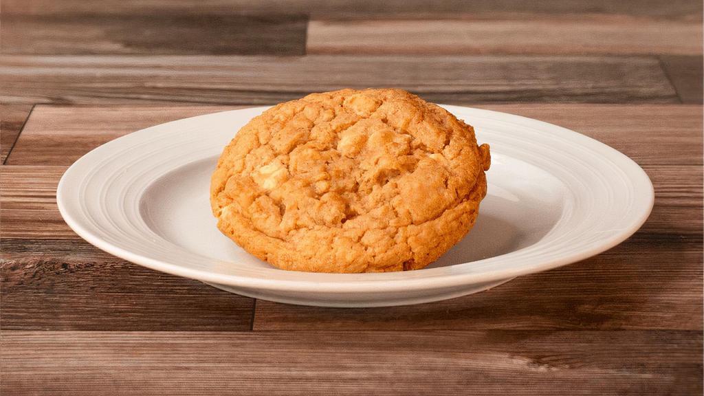 White Chocolate Macadamia Cookie | 1Pc · A chewy cookie with melty white chocolates and macadamias.