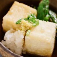 Agedashi Tofu · Fried Tofu topped with Bonito, seaweed, green onions, and Tempura sauce.