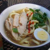 Chicken Udon Soup · Japanese-style soup, prepared with Udon (thick flour noodles), Chicken, green onions, seawee...