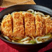Ton Katsu (Pork) Udon Soup · Japanese-style soup, prepared with Udon (thick flour noodles), Breaded deep-fried Pork, gree...