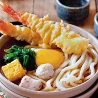 Tempura Mix Udon Soup · Japanese-style soup, prepared with Udon (thick flour noodles), Breaded deep-fried seafood an...