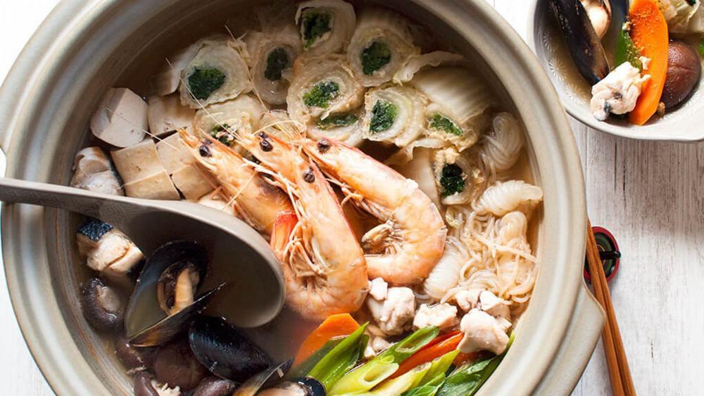 Yose Nabe (Seafood & Chicken) Soup · Japanese-style clear broth soup made with shrimp, scallops, salmon, mussels, chicken, tofu, vegetables and clear noodles.