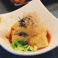 Agedashi Tofu · Vegetarian. Fried tofu with light soy sauce garnished with bonito.