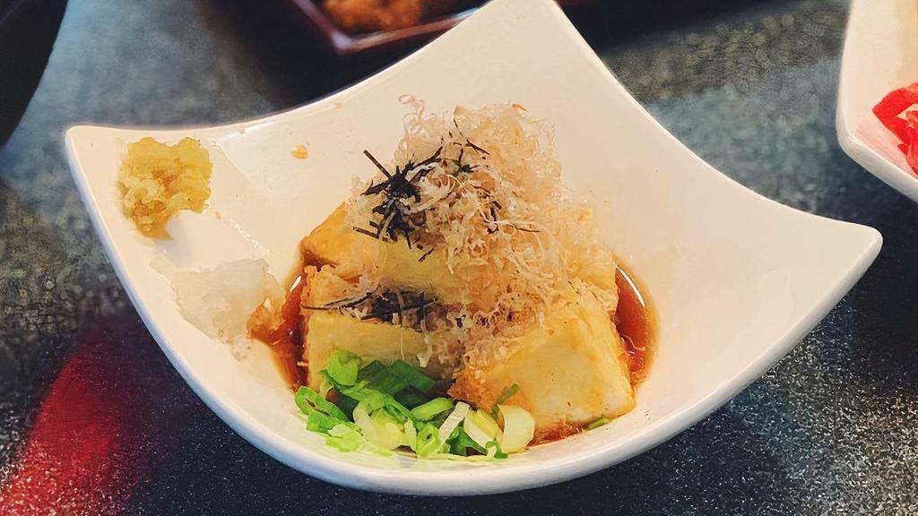 Agedashi Tofu · Vegetarian. Fried tofu with light soy sauce garnished with bonito.