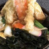 Nabeyaki Udon · Your choice of shoyu flavor or miso flavor with shrimp and veggie tempura.