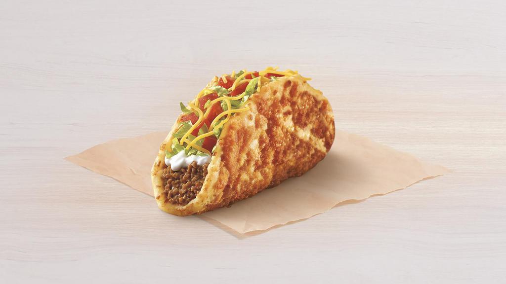 Toasted Cheddar Chalupa · A Chalupa shell with 6-month aged cheddar toasted on the outside and with seasoned beef, reduced-fat sour cream, tomatoes, lettuce, and cheddar cheese on the inside.