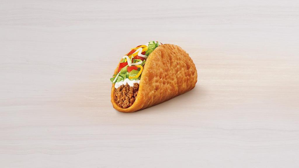 Chalupa Supreme® · Chewy fried chalupa bread filled with seasoned beef, sour cream, crispy lettuce, three-cheese blend and ripe tomatoes.