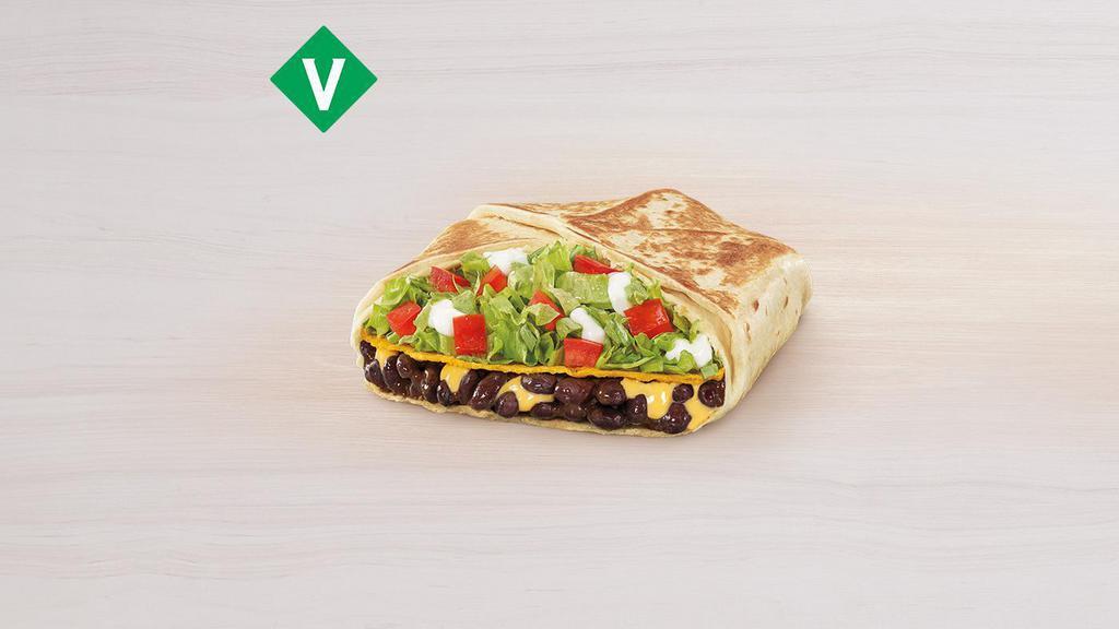 Black Bean Crunchwrap Supreme® · Flour tortilla, black beans, nacho cheese sauce, tostada shell, lettuce, tomatoes & reduced fat sour cream layers grilled in a crunchwrap. Item is lacto-ovo, allowing for dairy & egg consumption. Preparation method may lead to cross contact with meat