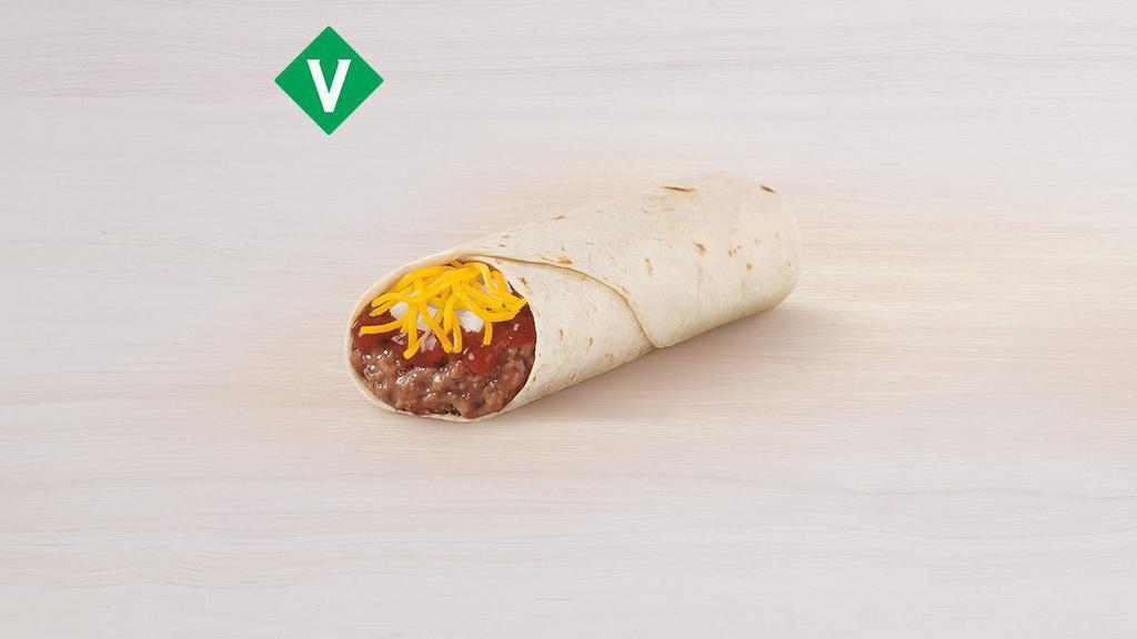 Bean Burrito · Warm flour tortilla filled with refried beans, shredded cheddar cheese, flavorful red sauce and diced onions. Item is lacto-ovo, allowing for dairy & egg consumption. Preparation methods may lead to cross contact with meat. See ta.co for full details.