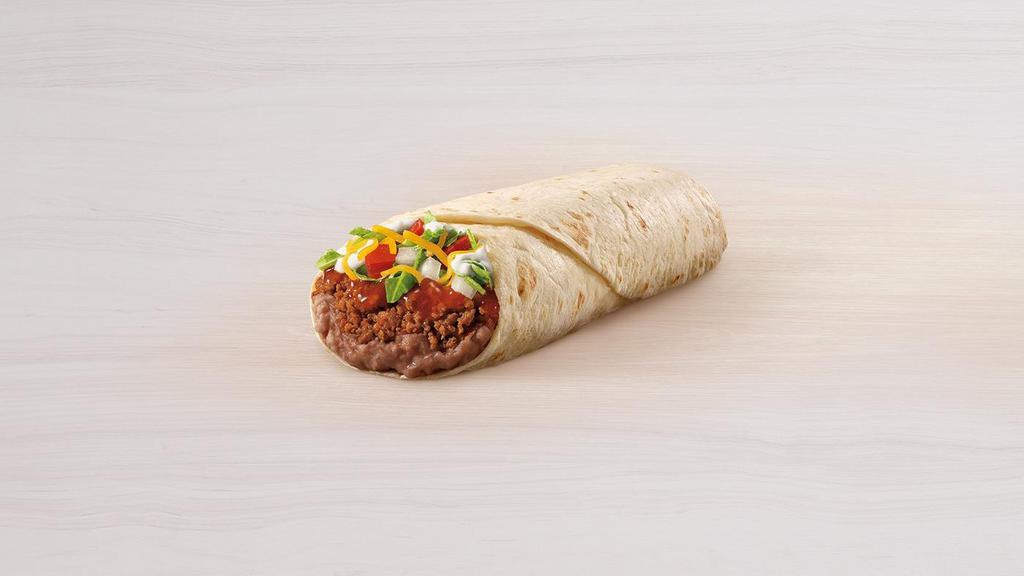 Burrito Supreme® · A warm flour tortilla loaded with seasoned beef, refried beans, tomatoes, onions, iceberg lettuce, reduced-fat sour cream, red sauce and cheddar cheese.