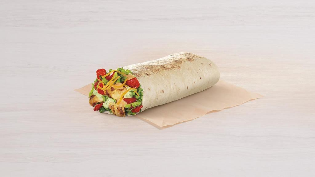 Chipotle Ranch Grilled Chicken Burrito · Grilled chicken, fiesta strips, avocado ranch sauce, creamy chipotle sauce, lettuce, tomatoes, and real shredded cheddar cheese wrapped inside a warm flour tortilla.