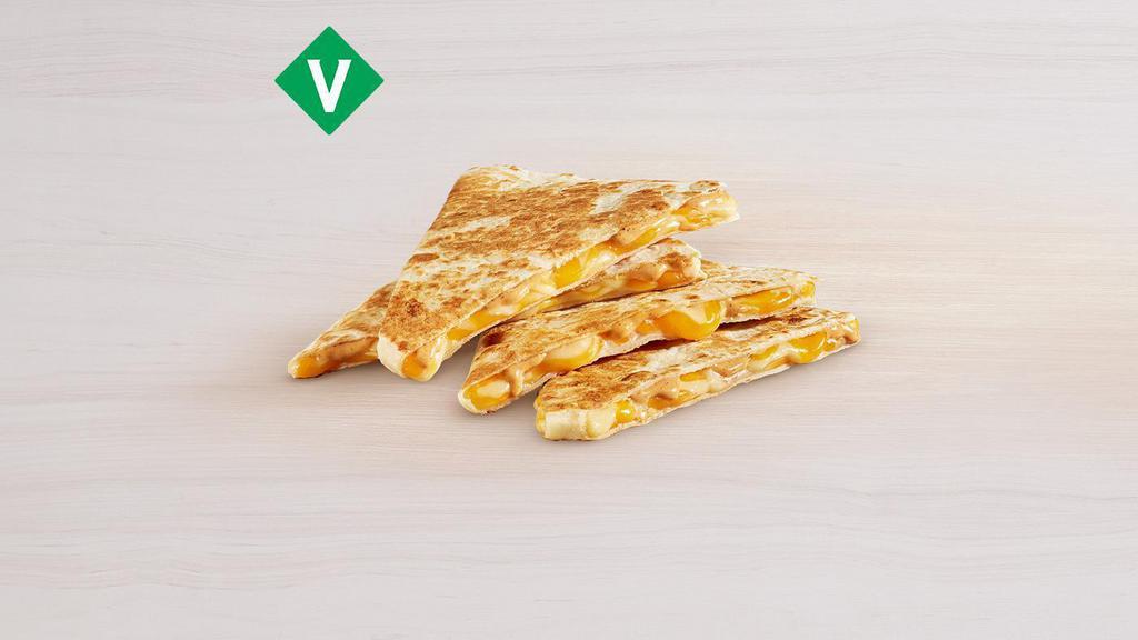 Cheese Quesadilla · Large flour tortilla filled with melty three-cheese blend, creamy jalapeño sauce, perfectly folded & grilled. Item is lacto-ovo, allowing for dairy & egg consumption. Preparation methods may lead to cross contact with meat. See ta.co for full details.