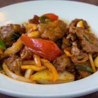 26) Myanmar Beef Kebat · Spicy. Marinated beef stir fried with paprika, masala, tamarind, green chilies, mint leaves,...