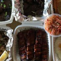 SILOG FIESTA · Pork Tocino, Beef Tapa, Pork Sisig, Pork BBQ, Eggplant Ensalada, EGGS, Garlic Rice, Atchara ...