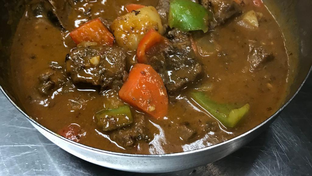 Kalderetta · TRIBU GRILL SPECIAL: Special price promotion, steamed rice for 3 people included. Filipino beef stew w/ potatoes, carrots, red bell pepper, and olives.