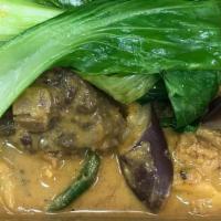 Kare Kare · Oxtail, beef shank, pechay, eggplant, and sitaw cooked in our own peanut butter sauce.