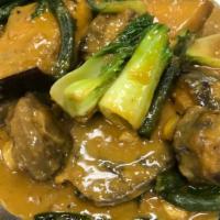 Beef Kare Kare · Beef, pechay,eggplant and sitaw w/ our own peanut sauce.