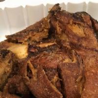 Crispy Pata · Pork knuckles fried crispy w/ moist meat and tendons.