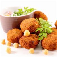 Vegan Falafels (4) · 4 Fresh crispy falafel balls made with chickpeas and seasoning.