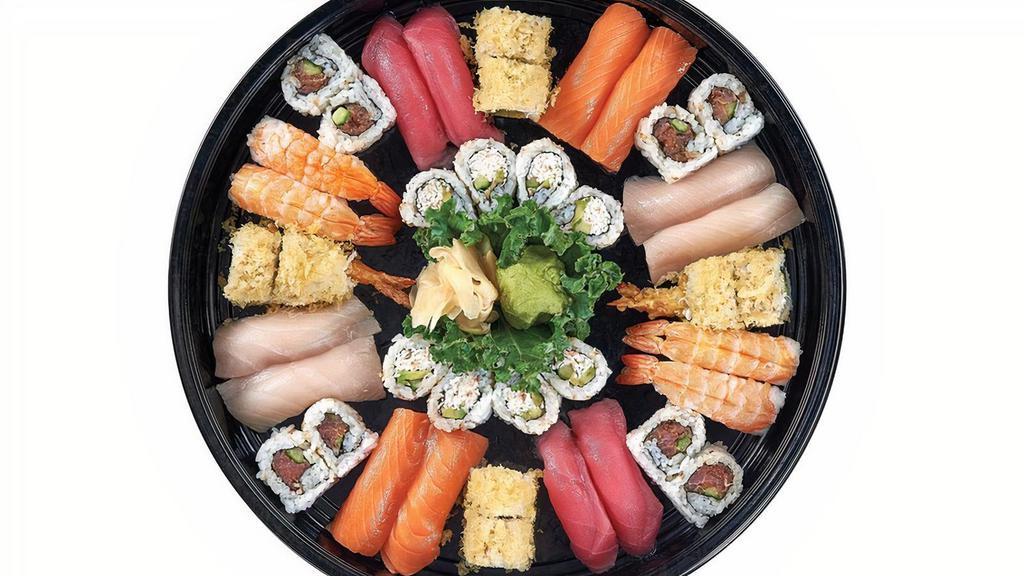 Emperor Platter · 1 Shrimp Crunchy roll, 1 Californian roll, 1 Spicy Tuna roll, 4 pcs Tuna nigiri, , 4 pcs Salmon nigiri, 4 pcs Yellowtail nigiri and 4 pcs Shrimp nigiri.