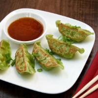 Edamame & Vegetable Gyoza Dumplings · Spicy sesame soy dipping sauce.