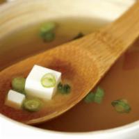 MISO SOUP · A delicious blend of miso, green onion and tofu.