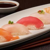 Sushi Sampler · Tuna, salmon, snapper, yellowtail and shrimp nigiri.