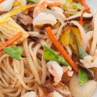 Seafood Diablo · Sea scallops, calamari, shrimp, assorted vegetables and Japanese udon noodles grilled in a h...