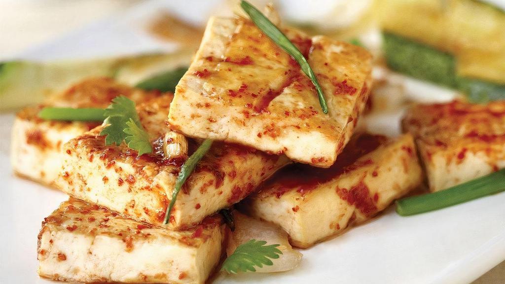 Spicy Tofu Steak  · Tofu, scallions and cilantro grilled in a special spicy homemade sauce.. 5 course meals served with. •BENIHANA ONION SOUP•BENIHANA SALAD . •HIBACHI SHRIMP APPETIZER •HIBACHI VEGETABLES •HOMEMADE DIPPING SAUCES •STEAMED RICE•JAPANESE HOT GREEN TEA