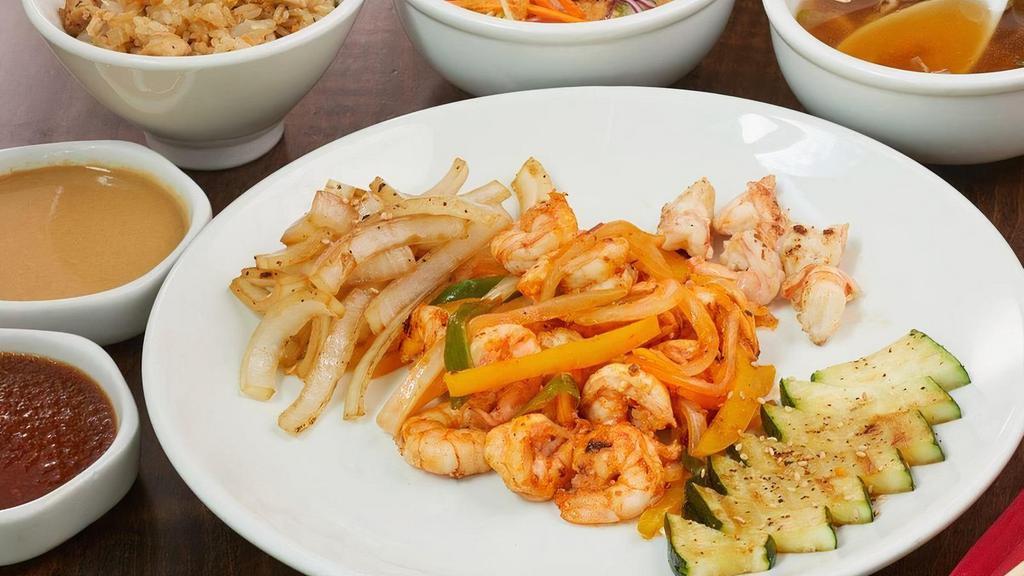Spicy Hibachi Shrimp · Hibachi shrimp grilled with onions, scallions and yellow peppers in a spicy homemade sauce.