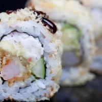 Shrimp Crunchy Roll · Shrimp tempura, spicy krab† mix and cucumber rolled and topped with red tempura bits; served...