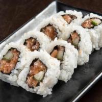 SPICY SALMON ROLL · Salmon mixed with spicy mayo combined with cucumber, rolled in seaweed and rice
