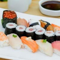 Sushi* Deluxe · Tuna Roll served with a piece of tuna, salmon, salmon roe, snapper, eel, yellowtail, shrimp,...