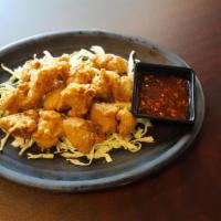 4. Popcorn Chicken · with Soy or Spicy sauce