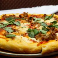 Salsiccia Pizza · All natural garlic fennel sausage, herbed ricotta, basil, mozzarella, and homemade tomato sa...