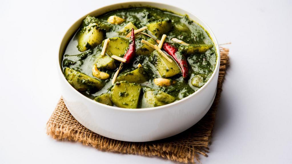 Palak Aloo · Potatoes cooked with spinach.
