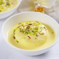 Ras Malai · Small dumplings made from milk and sweetened and flavored with cardamom.