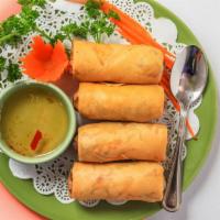 Thai Spring Rolls (4) · Deep fried rolls stuffed with glass noodles, carrots, cabbage, yellow onions and celery serv...