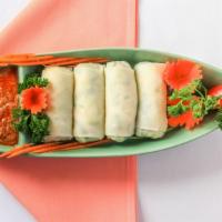 E-Saan Fresh Rolls (4) · Rolls stuffed with rice noodles, tofu, mint, lettuce, bean sprouts, and cilantro served with...