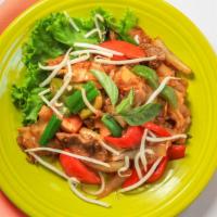 E-Saan Spicy Noodles  · Mild. Flat noodles stir fried with yellow onions, tomatoes, bell peppers, bean sprouts, gree...